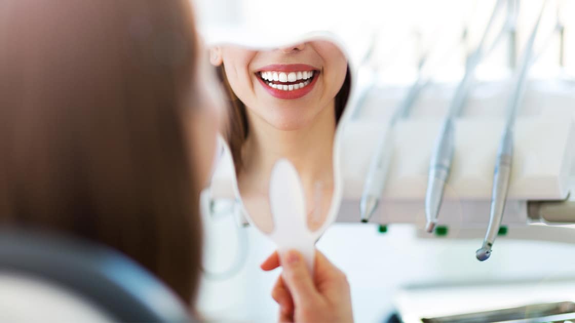 Beautiful Smile Reflected in Mirror