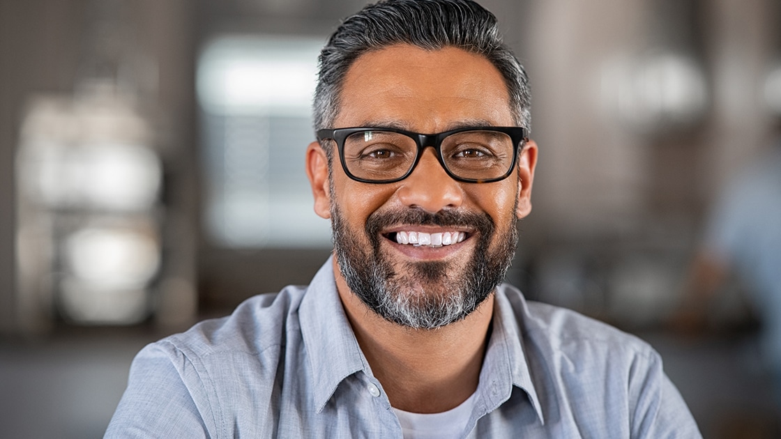 Smiling Mature Man at Dental Office Photo